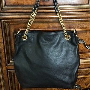 Michael Kors black shoulder bag.